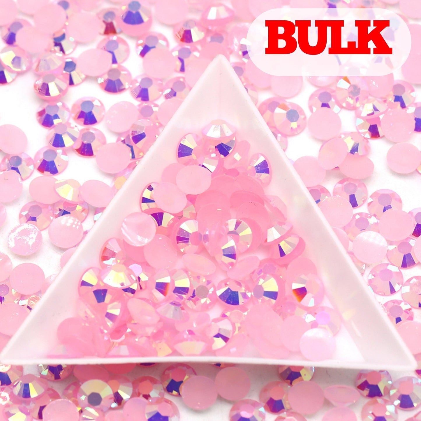 https://www.bling-that.com/cdn/shop/products/bling-that-jelly-2mm-bulk-ab-light-pink-jelly-rhinestone-32734456381628.jpg?v=1652879349&width=1445
